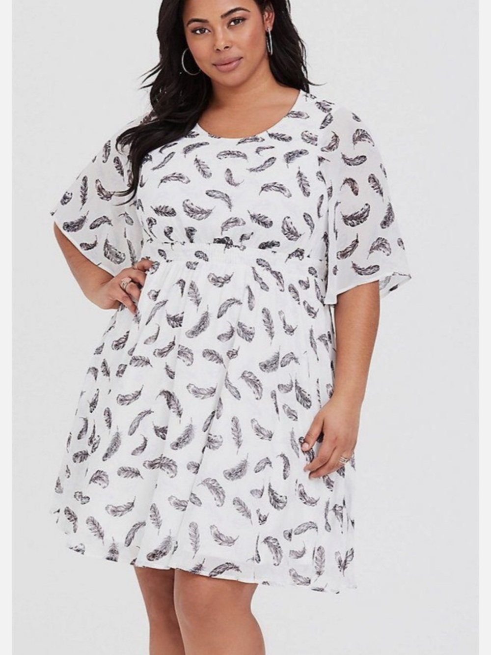 Torrid White Flowy dress with feathers